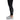 Close-up of a person's legs wearing black leggings with the text 'SKEETER' and light gray shoes.