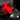 Close-up of a red towing hook attached to a vehicle's hitch.