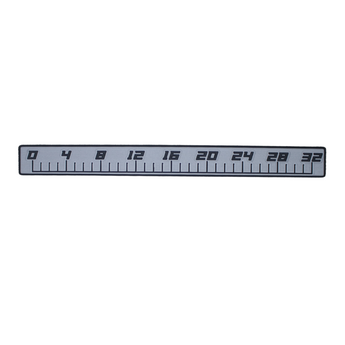 A grey and black foam ruler decal measuring from 0 to 32 inches. 