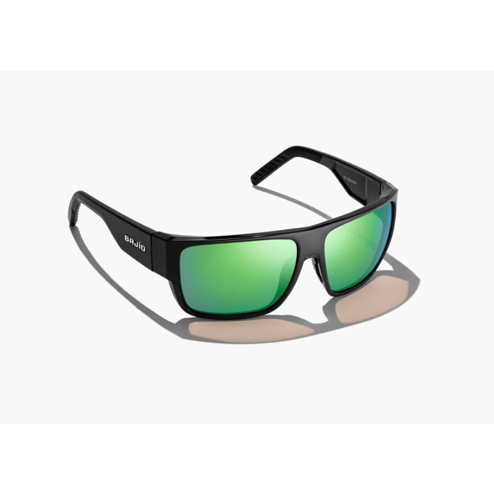 Sunglasses with green lenses and black frame on a white background.