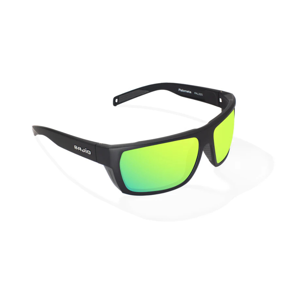 Sunglasses with green lenses and black frame on a white background.