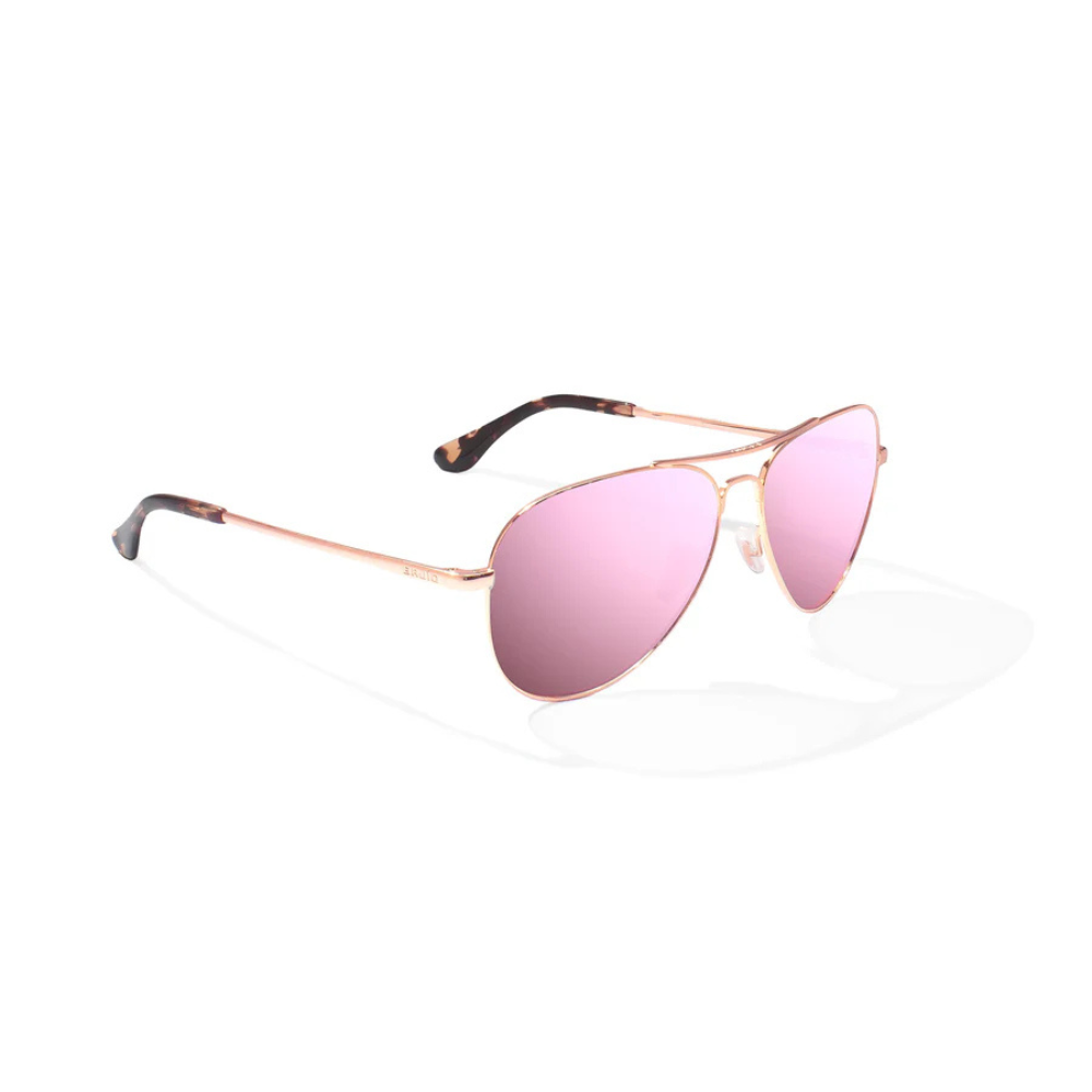 Thin rose gold metal framed sunglasses with pink lenses.