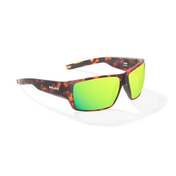 Sunglasses with an orange and black tortoiseshell frame and green gradient lenses on a white background.