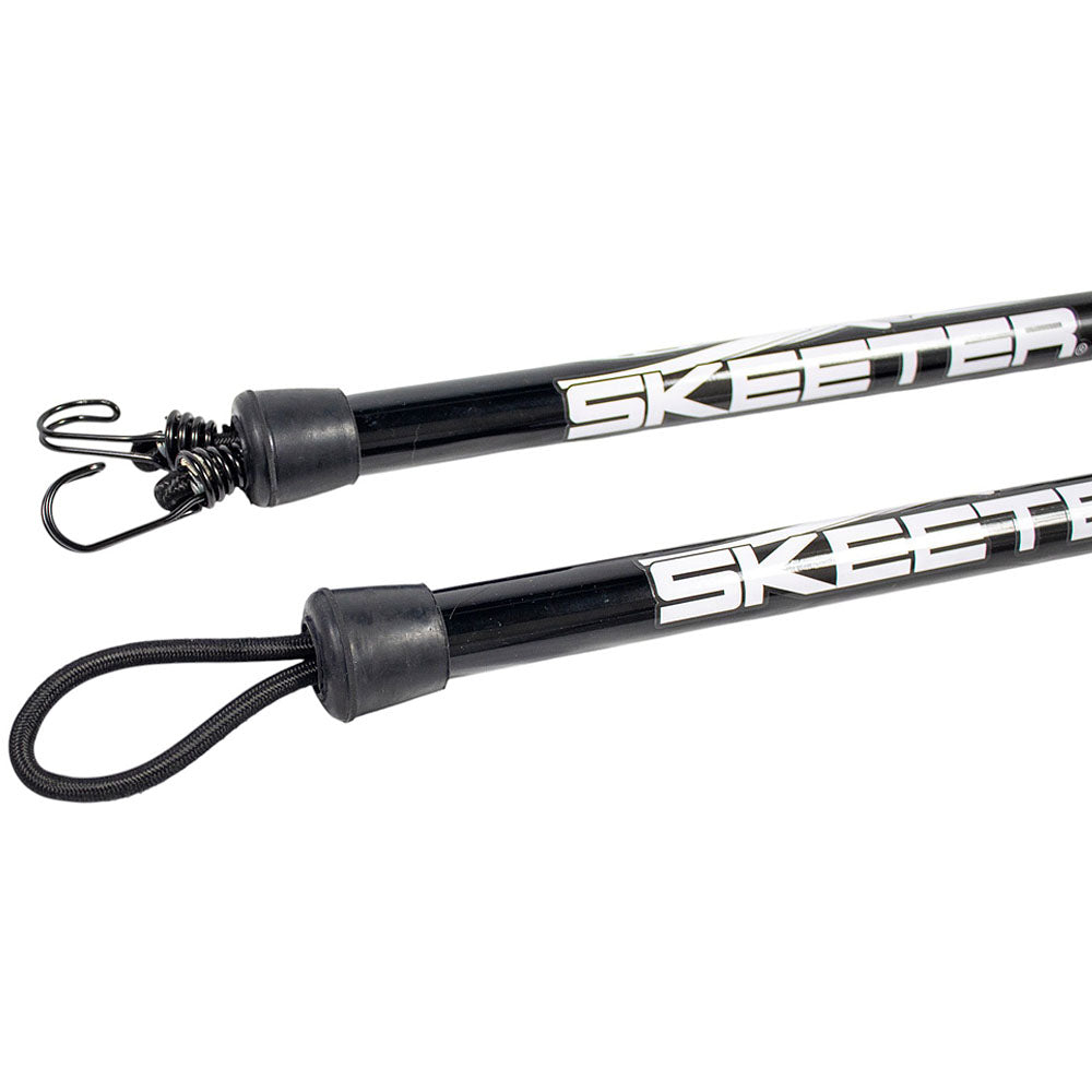 A close up of a set of dock buddies with a looped rope on one end and two hooks on the other end. 