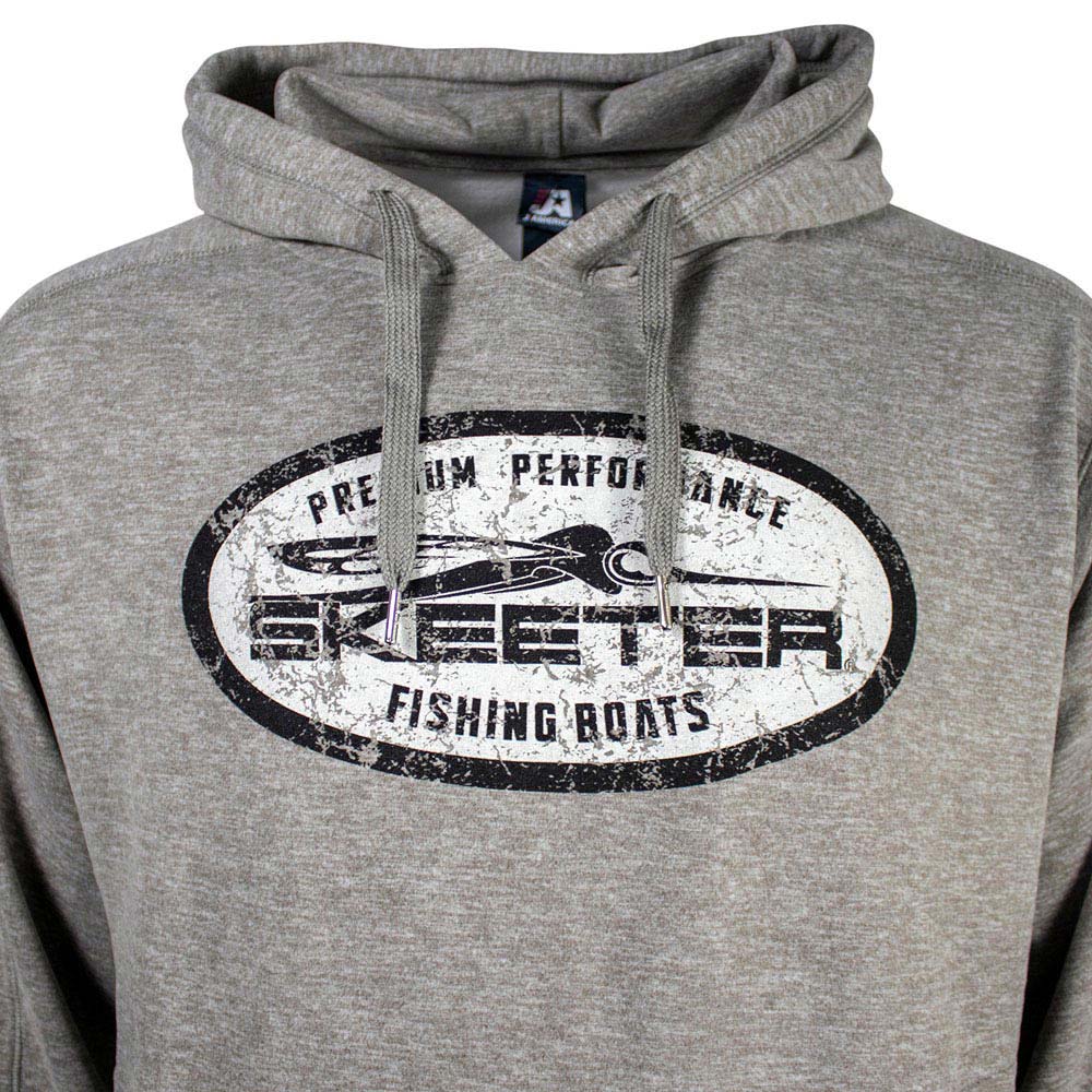 The chest of a heathered grey hoodie with flat drawstrings. Printed across the chest is a black and white distressed oval containing the skeeter logo in black. 