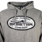 The chest of a heathered grey hoodie with flat drawstrings. Printed across the chest is a black and white distressed oval containing the skeeter logo in black. 