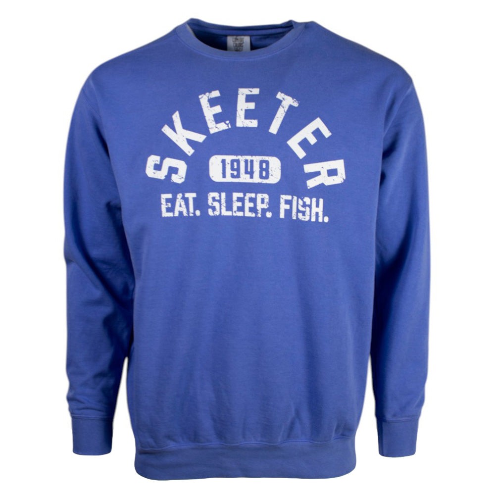 A blue sweatshirt with a white 'Skeeter, 1948, Eat. Sleep. Fish.' text on the front. 