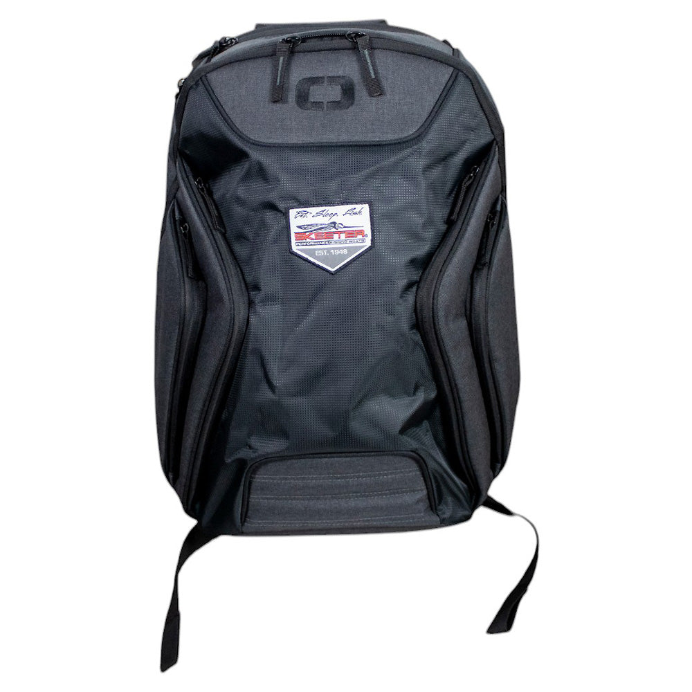 Front of a black Ogio backpack with a pentagon shaped Skeeter patch in the center reading "Eat. Sleep. Fish. Skeeter Performance Boats Est. 1948."