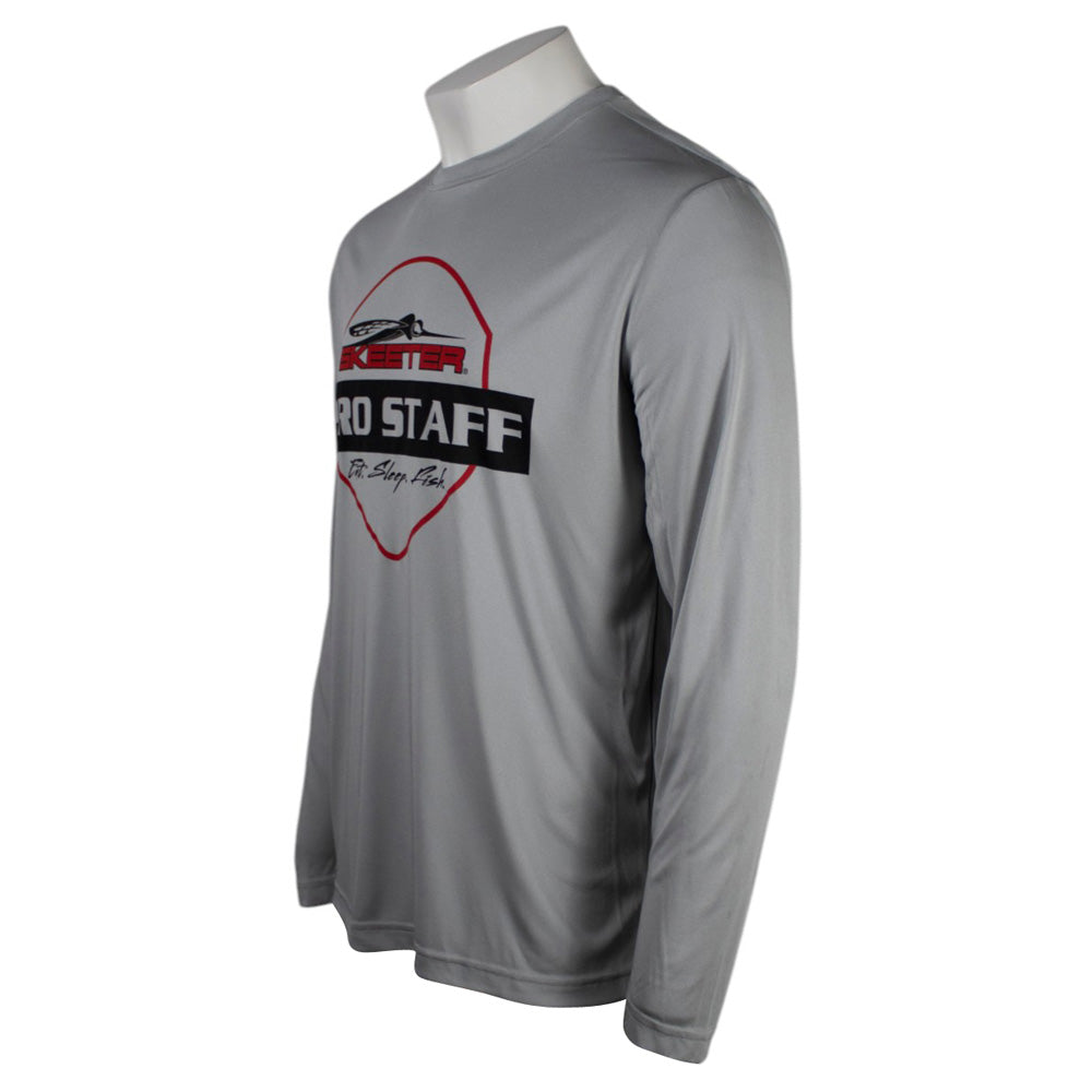 Side of a gray performance long-sleeve shirt with a logo on the front. 