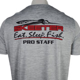 Back of a gray t-shirt with a red and black Skeeter logo and the text 'eat, sleep, fish' and 'pro staff' on the shoulder blades.