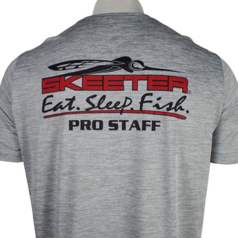 Back of a gray t-shirt with a red and black Skeeter logo and the text 'eat, sleep, fish' and 'pro staff' on the shoulder blades.