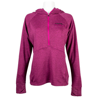 Front of a ladies UPF hooded half-zip long sleeve in fuchsia pink. Embroidered on the left chest is the skeeter logo in pink and black. 