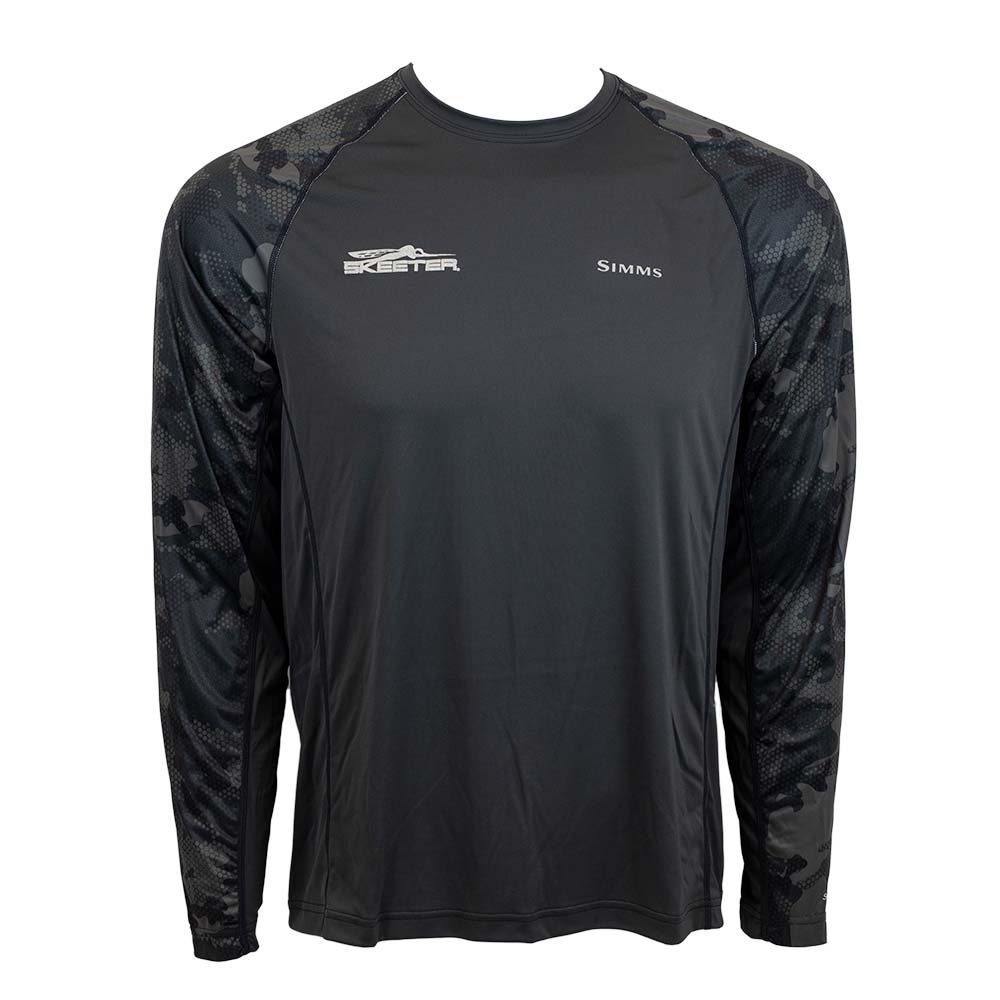 Front of a black UPF long sleeve with black and grey camo sleeves. Printed on the right chest is the skeeter logo in grey. 