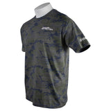 The left side of a green camo tee with the Skeeter logo printed in white on the left chest and the Yamaha logo printed in white above the sleeve cuff. 
