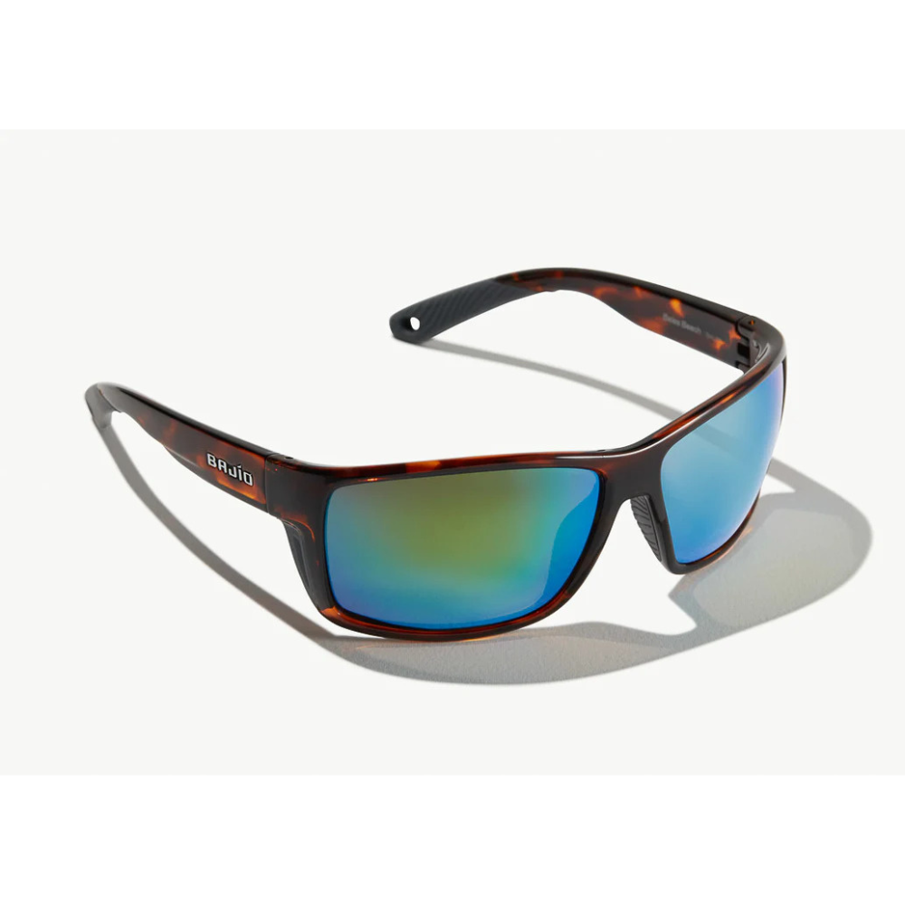 Sunglasses with brown tortoiseshell frames and blue/green reflective lenses.